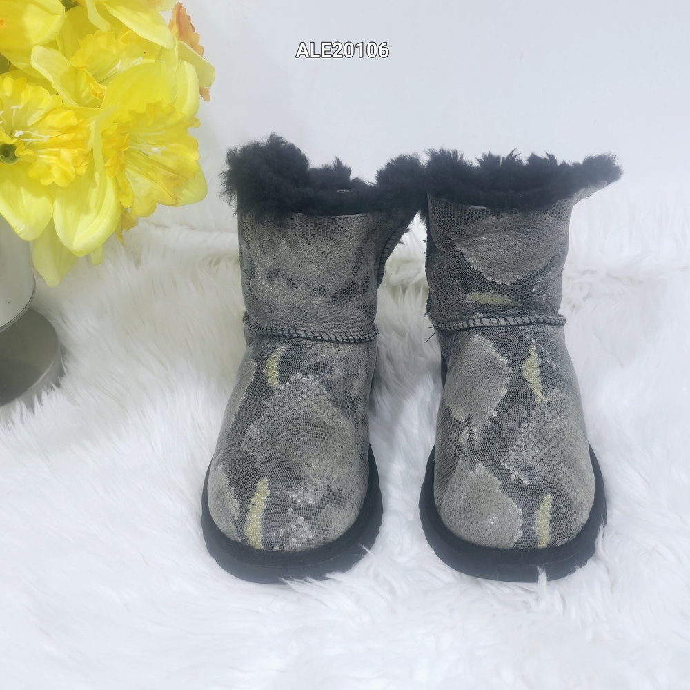 UGG Australia Women's Mini Bailey Bow Snake boots, size 7.